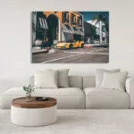 Salón moderno con cuadro grande de Ferrari F488 Spider amarilla colgado en la pared, sofá claro con cojines, mesa de café redonda y lámpara de pie, decoración contemporánea.