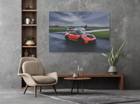 Fotografía Porsche GT3 RS naranja enmarcada en pared blanca - decoración mural automovilística