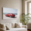 Cuadro de fotografía de autor de un Ferrari 348 TS en Pebble Beach colgado sobre un sofá en un salón luminoso